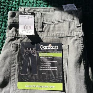 NWT Men’s Carhartt Loose Fit Carpenter Jean. Olive green. 34x32.